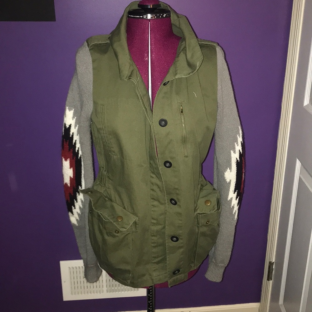 green army jacket with sweater sleeves